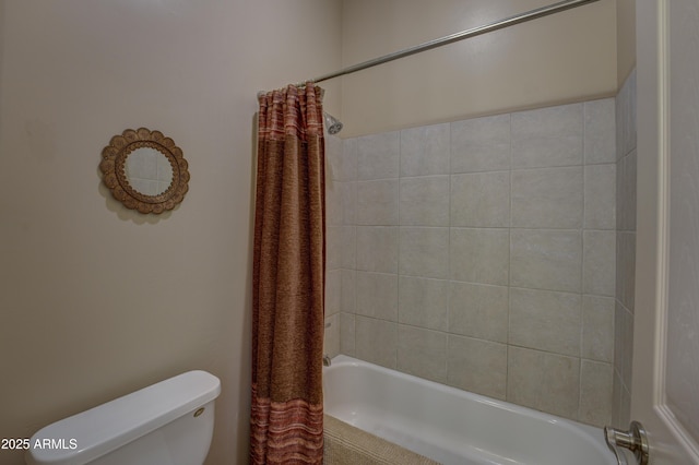 bathroom with toilet and shower / tub combo