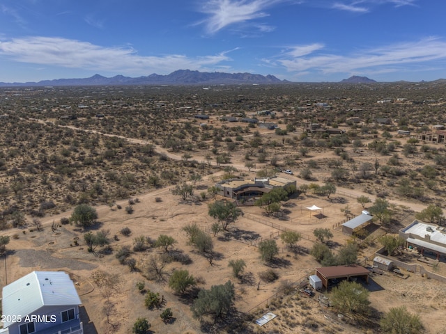 drone / aerial view featuring a mountain view