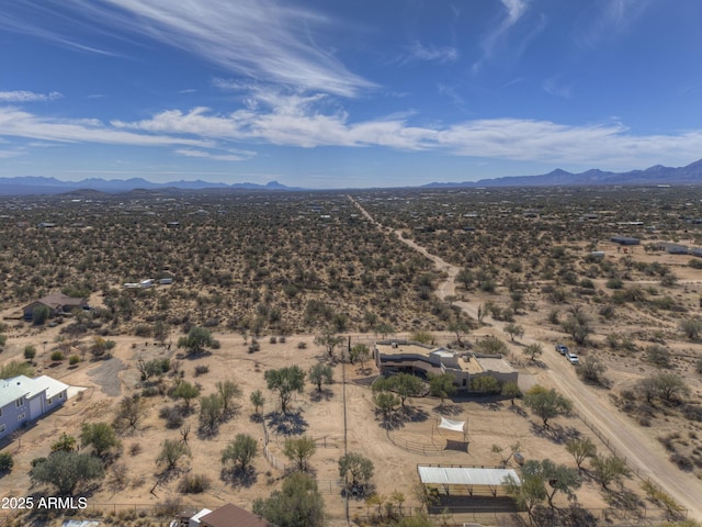 birds eye view of property featuring a mountain view