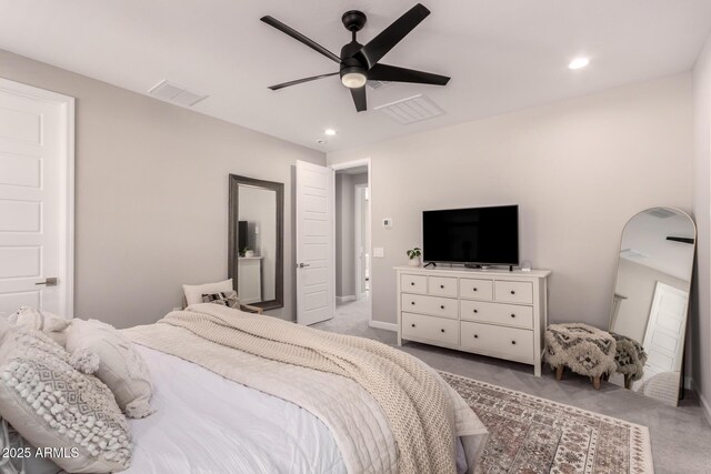 bedroom with a ceiling fan, recessed lighting, visible vents, and light colored carpet