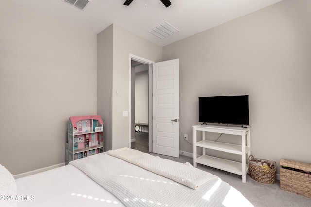 bedroom with a ceiling fan, baseboards, visible vents, and carpet flooring