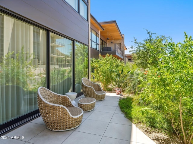 view of patio / terrace featuring a balcony