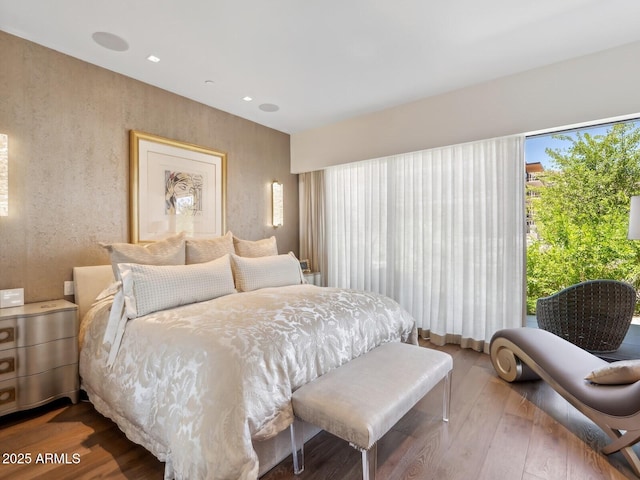 bedroom featuring wood finished floors