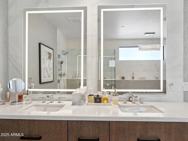 full bath featuring walk in shower and double vanity
