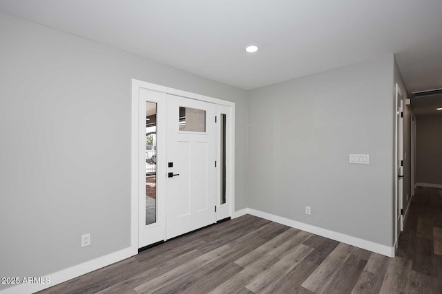 foyer with wood-type flooring