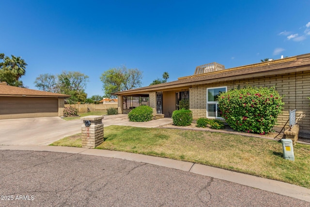 1012 E Wagon Wheel Dr, Phoenix, AZ 85020 - single story home featuring fence, a front yard, and brick siding