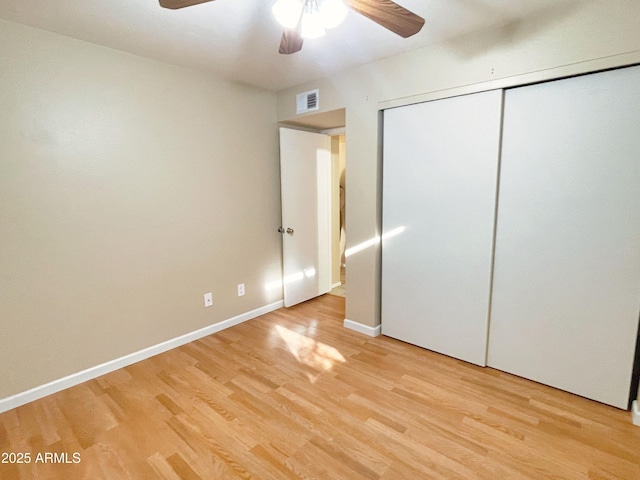 924 S Hacienda Dr Unit C, Tempe, AZ 85281 - unfurnished bedroom with light wood-style flooring, a closet, baseboards, and ceiling fan