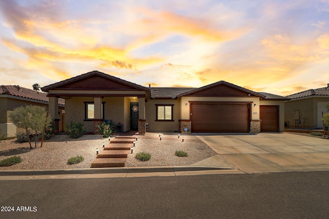 prairie-style home featuring a garage