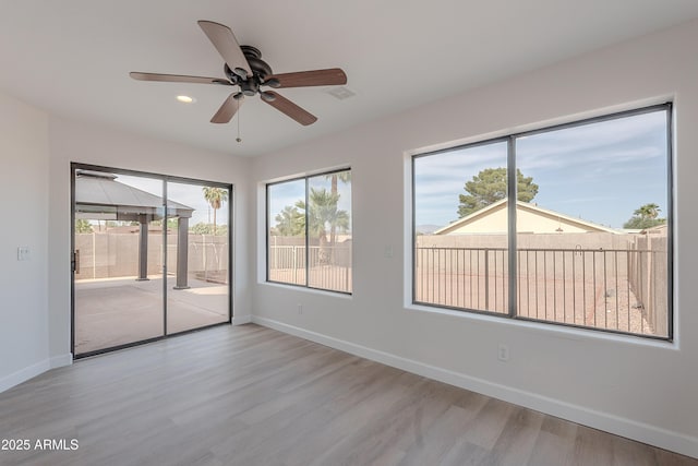 17207 E El Pueblo Blvd, Fountain Hills, AZ 85268 - spare room featuring a ceiling fan, wood finished floors, recessed lighting, and baseboards
