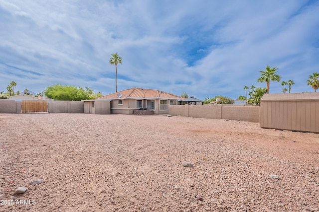 17207 E El Pueblo Blvd, Fountain Hills, AZ 85268 - back of property with a fenced backyard and an outdoor structure