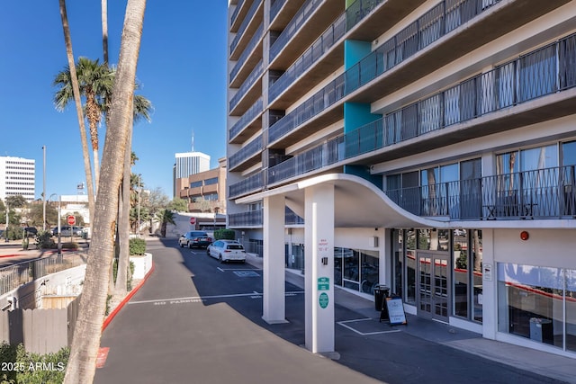 425 W Paseo Redondo Unit 5A, Tucson, AZ 85701 - view of building exterior featuring uncovered parking