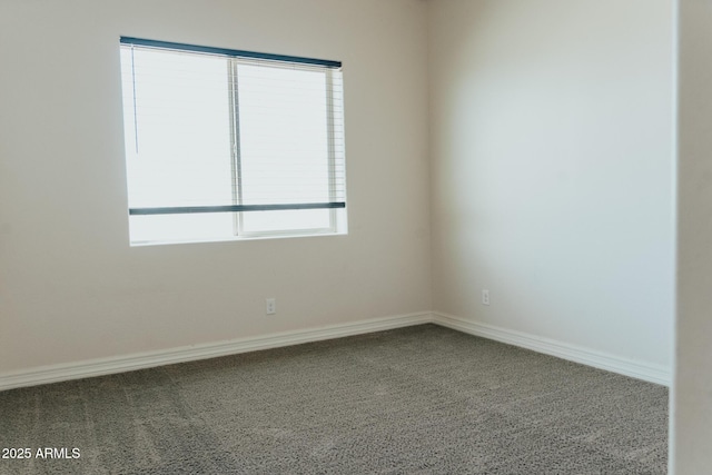 1623 E Hidalgo St, Apache Junction, AZ 85119 - carpeted spare room featuring baseboards