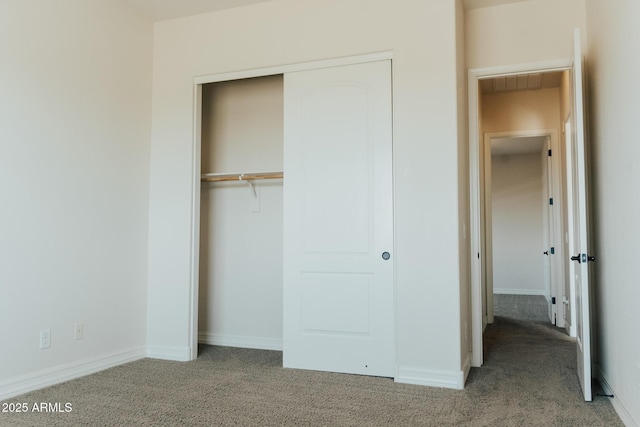 1623 E Hidalgo St, Apache Junction, AZ 85119 - unfurnished bedroom featuring carpet floors and a closet