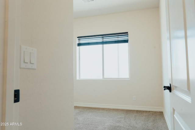 1623 E Hidalgo St, Apache Junction, AZ 85119 - empty room with carpet floors and baseboards