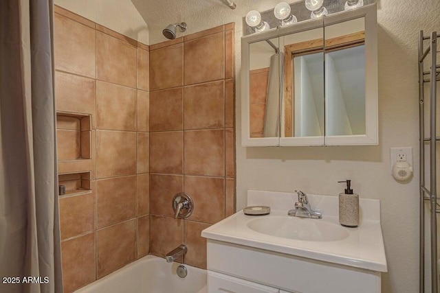 bathroom featuring vanity and shower / bath combo with shower curtain