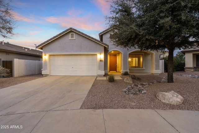 view of front of home with a garage