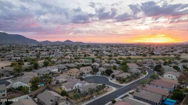 aerial view at dusk with a mountain view