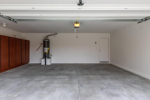 garage with secured water heater and a garage door opener