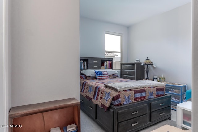 bedroom with light carpet