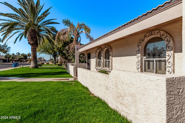 exterior space with a lawn