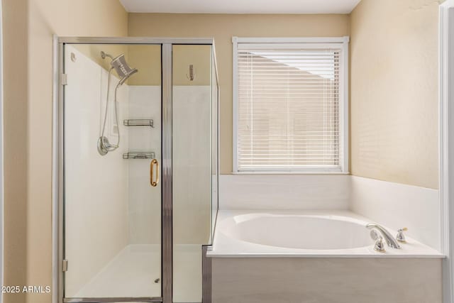 8256 W Bloomfield Rd, Peoria, AZ 85381 - full bathroom with a shower stall and a garden tub
