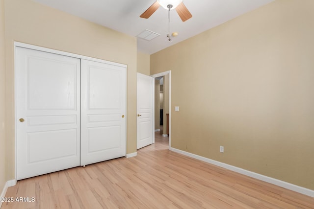 8256 W Bloomfield Rd, Peoria, AZ 85381 - unfurnished bedroom with light wood-style flooring, baseboards, and a closet