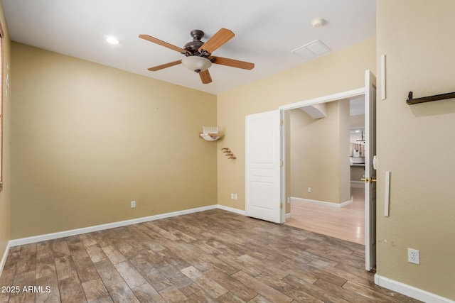 8256 W Bloomfield Rd, Peoria, AZ 85381 - spare room featuring wood finished floors, a ceiling fan, baseboards, a smoke detector, and recessed lighting