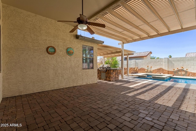 8256 W Bloomfield Rd, Peoria, AZ 85381 - fenced backyard with an outdoor kitchen, a pool with connected hot tub, ceiling fan, and a patio area