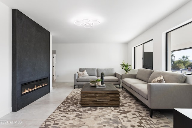 living room with a large fireplace