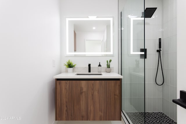 bathroom with vanity and walk in shower