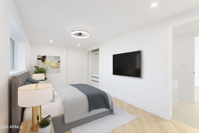 bedroom featuring light wood-type flooring