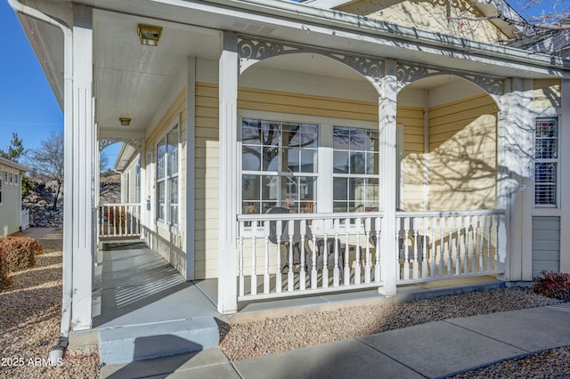 doorway to property with a porch