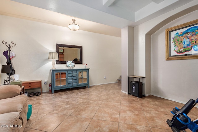 living room with light tile patterned flooring