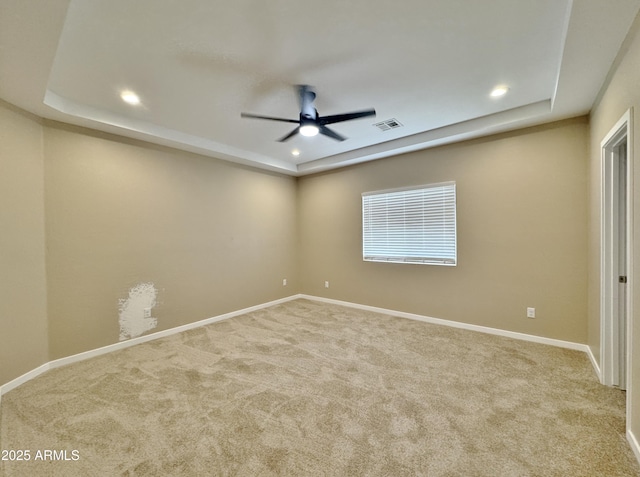 15422 S Sequoia Cir, Arizona City, AZ 85123 - carpeted spare room with a raised ceiling, a ceiling fan, and recessed lighting