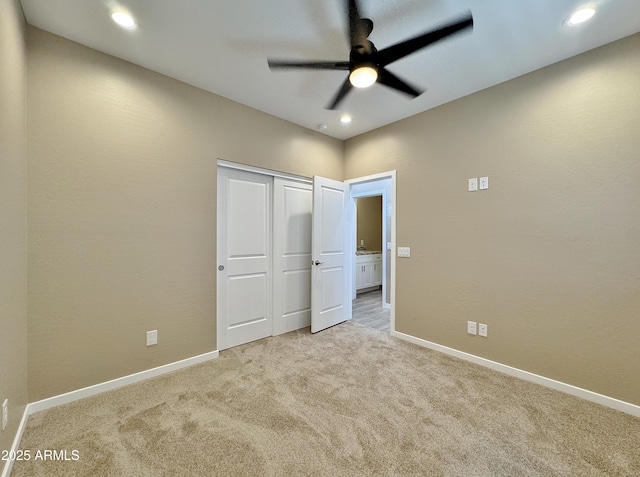 15422 S Sequoia Cir, Arizona City, AZ 85123 - unfurnished bedroom with recessed lighting, light colored carpet, and baseboards