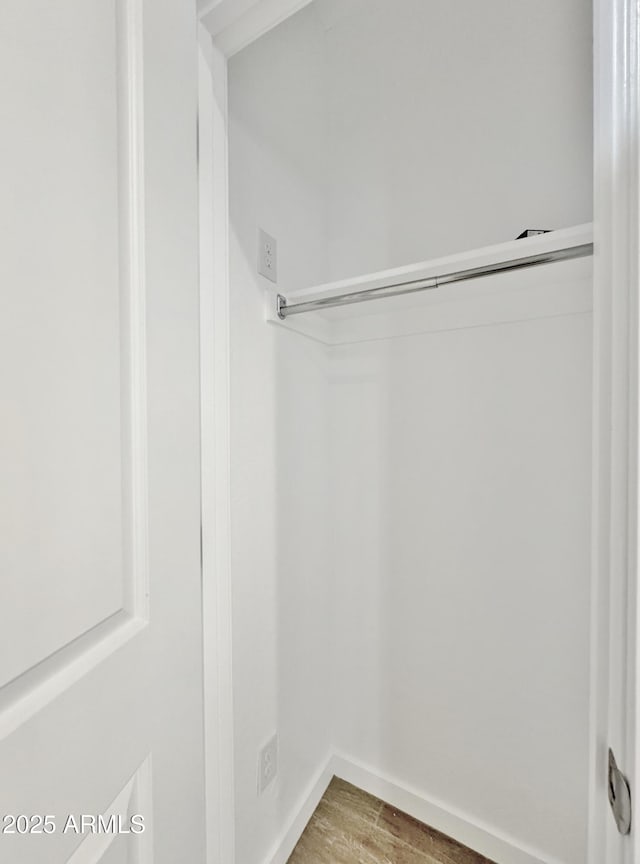 15422 S Sequoia Cir, Arizona City, AZ 85123 - walk in closet with light wood-type flooring