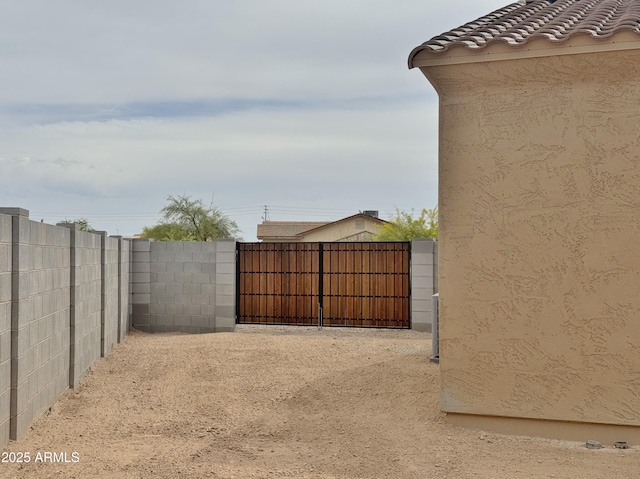 15422 S Sequoia Cir, Arizona City, AZ 85123 - view of yard featuring fence and a gate