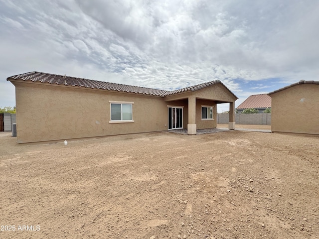 15422 S Sequoia Cir, Arizona City, AZ 85123 - back of property featuring central air condition unit, stucco siding, fence, and a tile roof