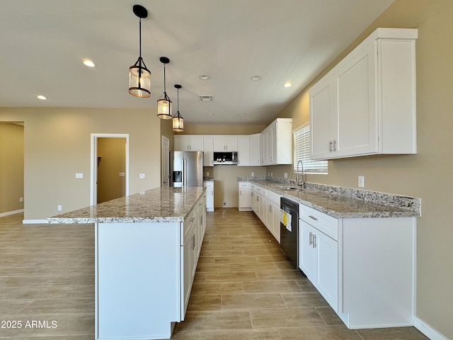 15422 S Sequoia Cir, Arizona City, AZ 85123 - kitchen with stainless steel appliances, recessed lighting, light wood-style flooring, and a sink