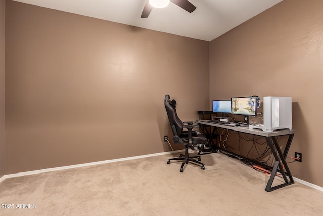 carpeted office with ceiling fan