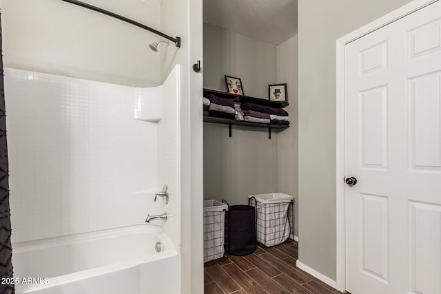 bathroom with shower / bath combination with curtain