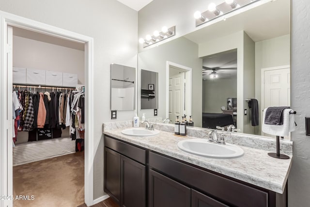 bathroom with vanity and ceiling fan