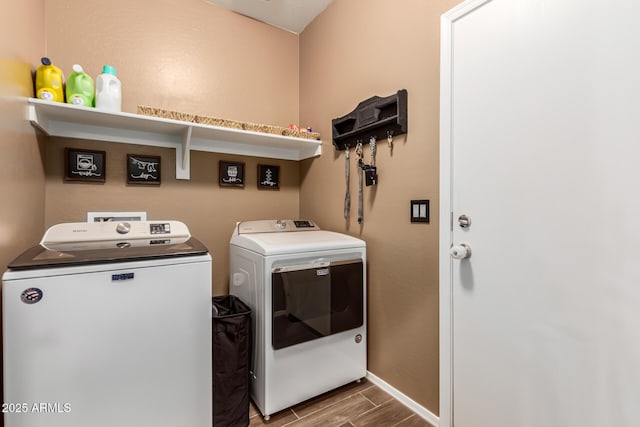 washroom featuring washer and dryer