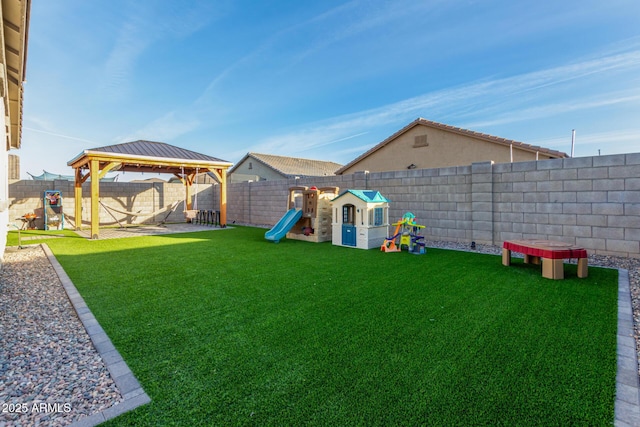 view of yard with a playground, a patio area, and a gazebo