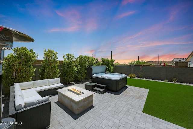 29339 N 135th Dr, Peoria, AZ 85383 - view of patio featuring a hot tub and an outdoor living space with a fire pit