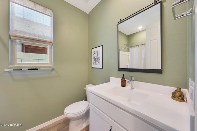 29339 N 135th Dr, Peoria, AZ 85383 - full bath with vanity, baseboards, toilet, wood finished floors, and a shower with shower curtain