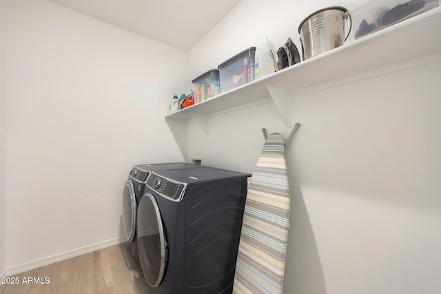 29339 N 135th Dr, Peoria, AZ 85383 - laundry area with independent washer and dryer, light wood-type flooring, and baseboards