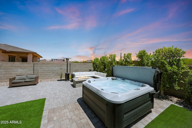 29339 N 135th Dr, Peoria, AZ 85383 - view of patio / terrace with a hot tub and an outdoor fire pit