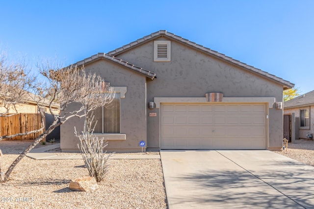 view of front of property featuring a garage