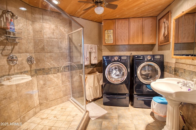 8455 Ridge Dr, Show Low, AZ 85901 - laundry room with washer and dryer, wooden ceiling, ceiling fan, and tile patterned floors